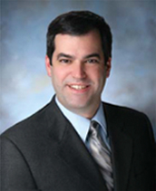 Portrait of John Scatoloni, Managing Director